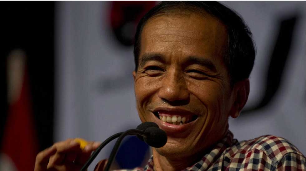 Joko Widodo, alias Jokowi, le 14 juin 2014, lors d'un meeting tenu à Solo, sa ville natale, dans l'est de l'île de Java. (Image d'illustration) © ROMEO GACAD/AFP